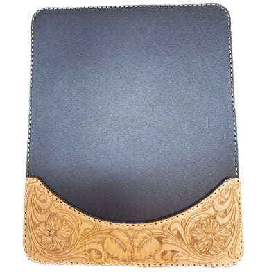A mouse pad with a tooled pattern border on a white surface.