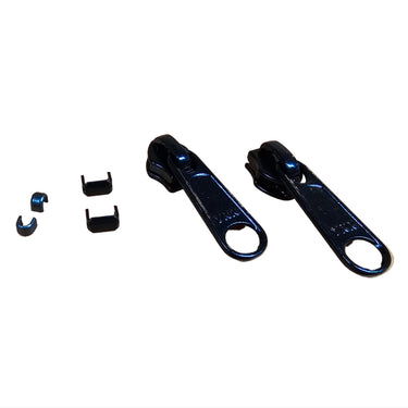 A black coil zipper kit displayed on a white surface, including two zipper pulls, two bottom stops, and a set of top stops.
