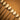 A close up of some daubers used for applying various applicators such as paint or adhesives. Laid out on a light brown textured leather background.