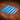 A set of blue acrylic templates used for creating custom belt ends made from leather. Laid out on a textured brown leather background.