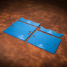 A set of acrylic blue templates for creating a custom `whatever' wallet, laid out on a brown textured leather background.
