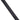 A navy blue 18 inch acrylic centering ruler with a grid on one side and markings on the other, placed on a white surface.