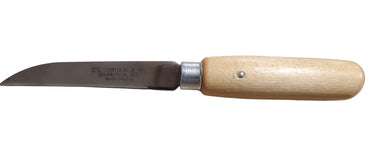 A knife with a wooden handle and a metallic blade, resting on a wooden surface.