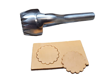 A metal rosette cutter with a sharp cutting edge and a welded handle, accompanied by two examples of rosette shapes cut from a tan material, placed on a white background.