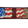 A wallet with an embossed pattern featuring the American flag and a decorative design on a brown background.