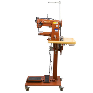 A Cobra Class 26 sewing machine for leather, mounted on a stand with wheels, displayed against a white background.