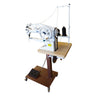 A Cobra Class 29-18 sewing machine mounted on a stand, with sewing accessories visible.