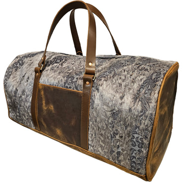 A classic duffel bag with a gray and brown pattern and leather accents, displayed on a white background.