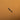 metal scalpel blade on a brown leather background