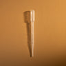 Clear plastic pipette on a brown textured background